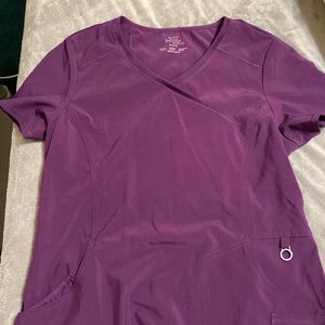 Eggplant purple scrub top. Has two pockets Gently used